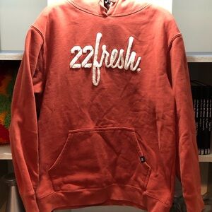 22 Fresh Orange Unisex Pullover Hoodie with Raised Logo